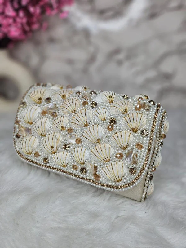 Embellished evening bags with gemstones or crystals for a dramatic, sparkling look -Designer Seude Flap Clutches