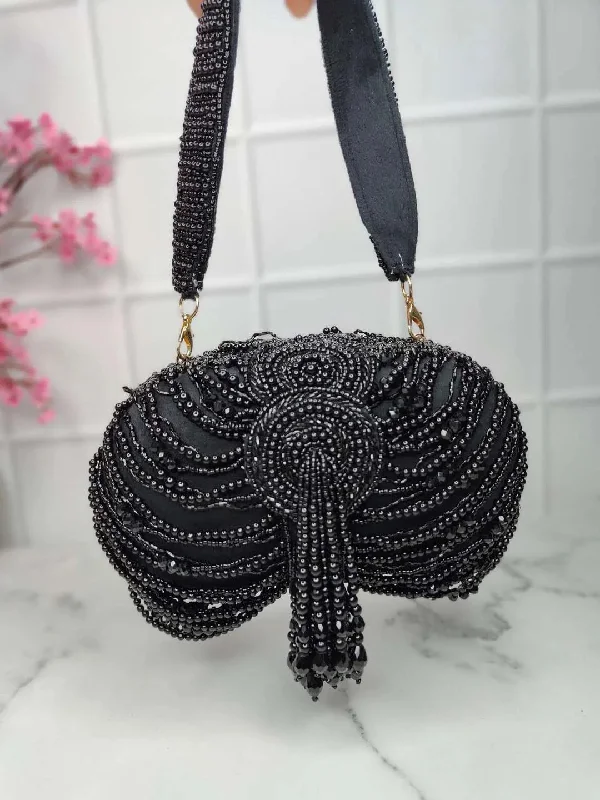 Chic evening clutch bags with polished metallic finishes for a contemporary evening accessory -Embroidery Tassel Oval Beauty Clutches