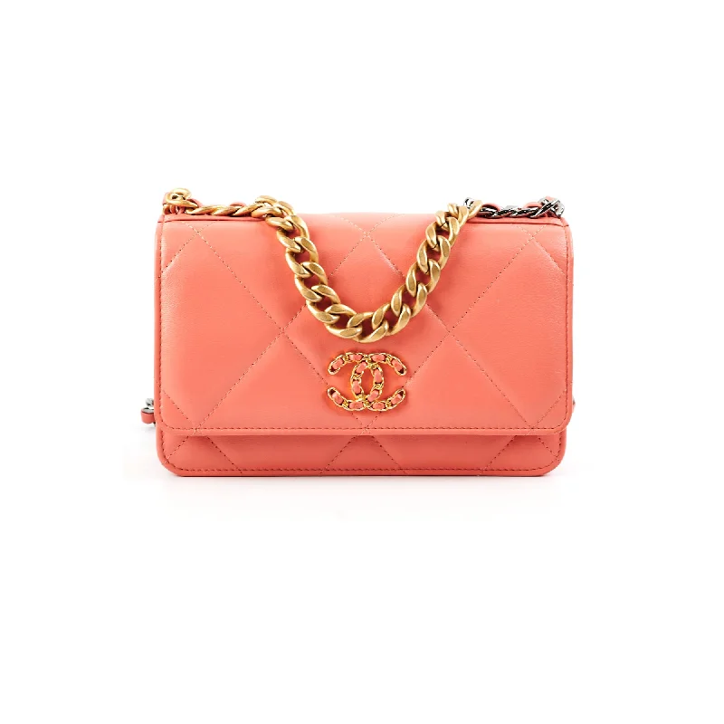 Sleek patent handle bags offering glossy modern shine -Chanel Wallet on Chain WOC 19 Coral