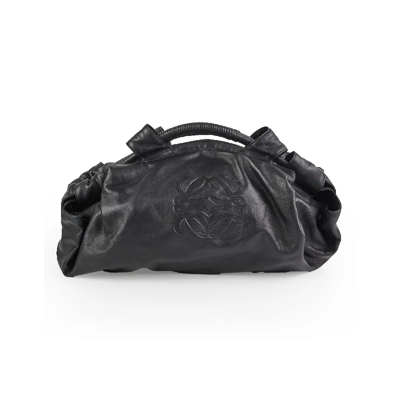 Metallic silver handle bags gleaming at dance events -Loewe Black Top Handle Bag