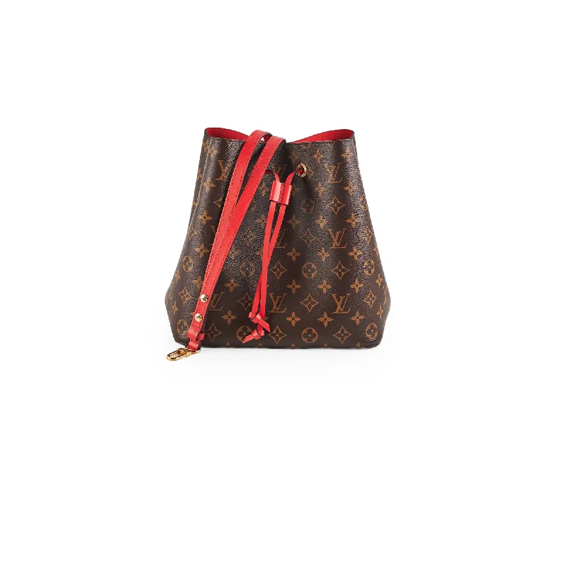 Bold red handle bags popping against neutral outfits -Louis Vuitton Neo Noe Monogram Red