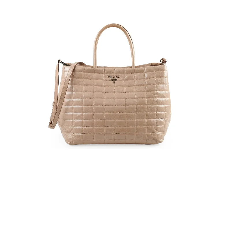 Handwoven straw handle bags evoking summer beach vibes -Prada Leather Tote Beige