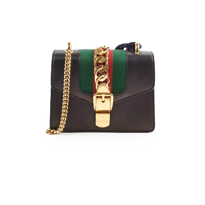 Glitter-dusted handle bags dazzling at evening galas -Gucci Mini Sylvie Black