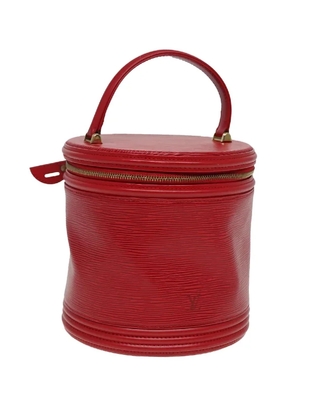 Earth-tone suede handle bags blending into nature -Epi Leather Red Hand Bag by Louis Vuitton