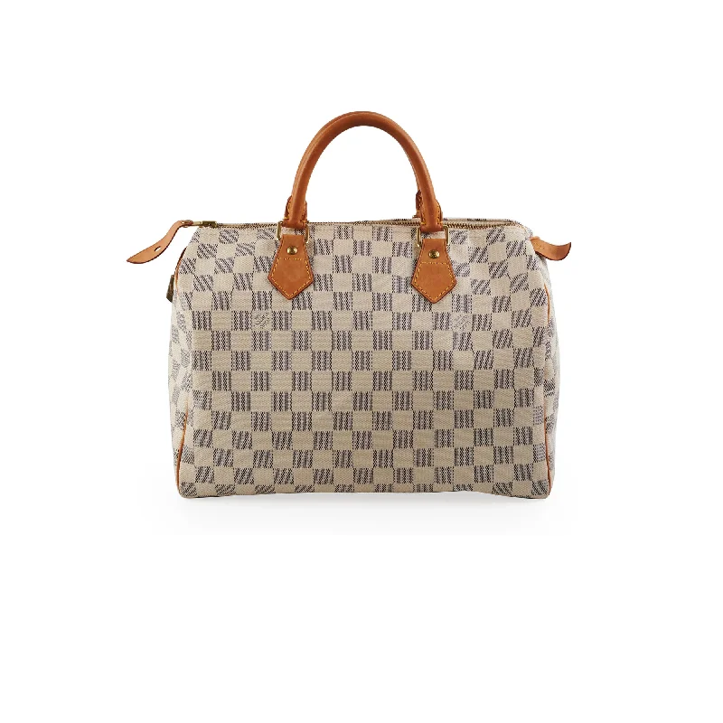 Vibrant yellow handle bags brightening up dull days -Louis Vuitton Speedy 30 Damier Azure