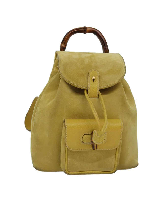 Anti-slip grip handle bags ensuring secure hand carry -Bamboo Handle Suede Hand Bag with Adjustable Shoulder Strap