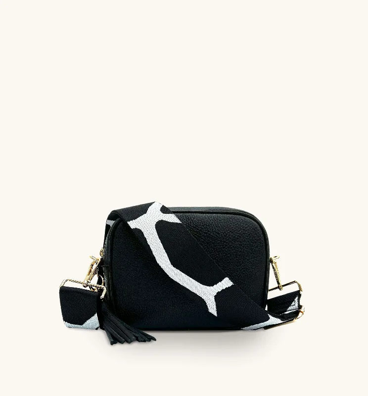 Durable oxford crossbody bags for heavy daily use -The Tassel Black Leather Crossbody Bag With Black & White Giraffe Strap