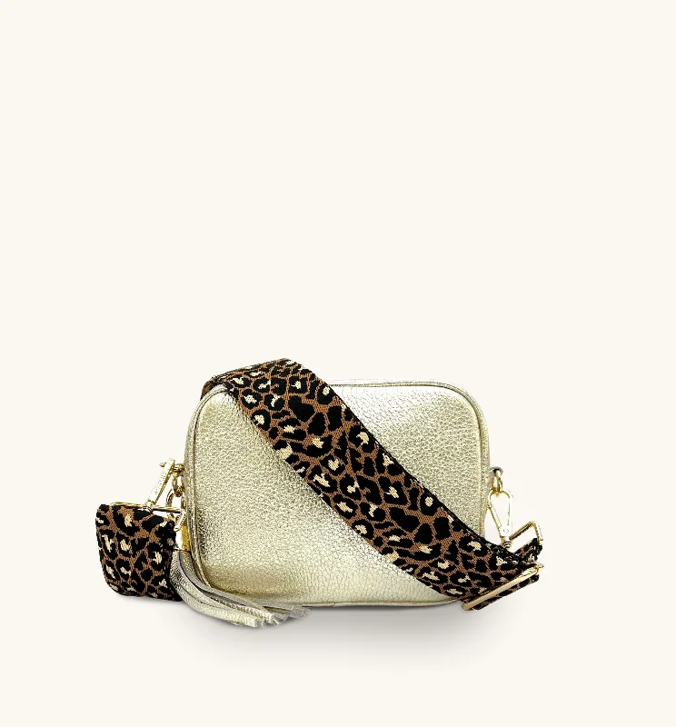 Lightweight packable crossbody bags folding into small pouches -The Tassel Gold Leather Crossbody Bag With Tan Cheetah Strap