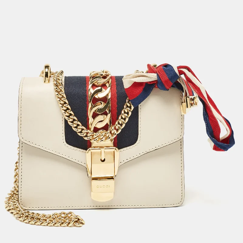 Flexible knit crossbody bags stretching for extra space -Gucci Off White Leather Mini Web Chain Sylvie Crossbody Bag