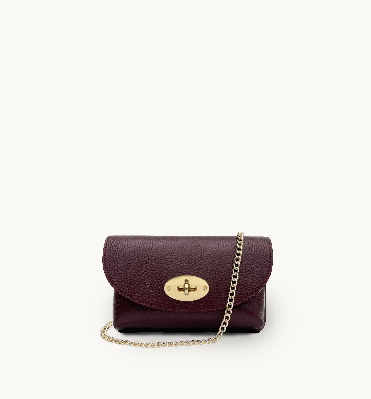 Vintage-inspired crossbody bags with brass hardware accents -The Mila Port Leather Phone Bag