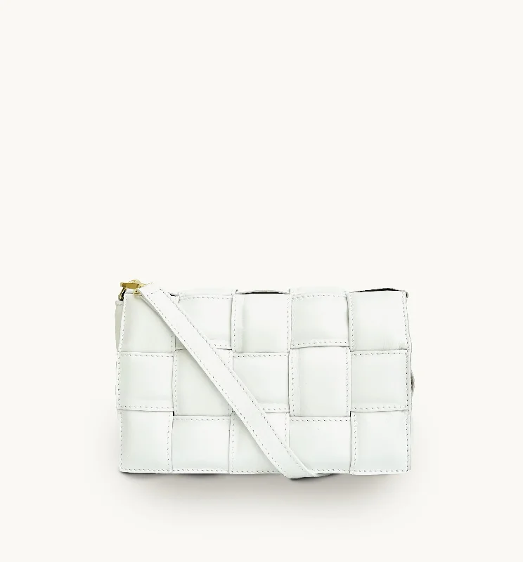 Heavy-duty leather crossbody bags aging into character -White Padded Woven Leather Crossbody Bag