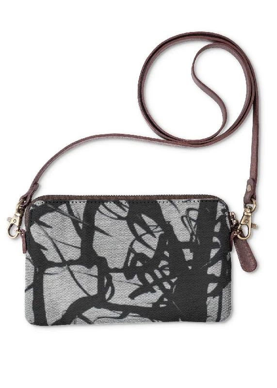 Evening bags with floral appliqués and beaded details for a feminine and intricate style -Tangled Trees